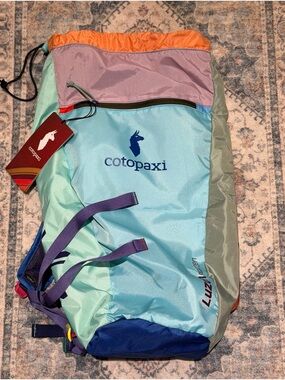 Vintage Cotopaxi Luzon 18L Del Día daypack — mint, blue, pink & orange